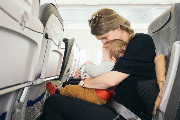 how to travel alone with a baby or older kids
